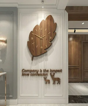 Leaf Wall Clock with Deer Silhouettes and Typography